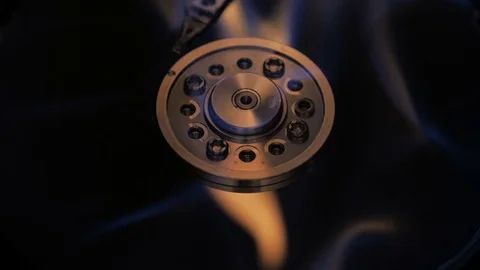 Hard disk burns in dark room. Data and business lost conception Stock Footage 73689851
