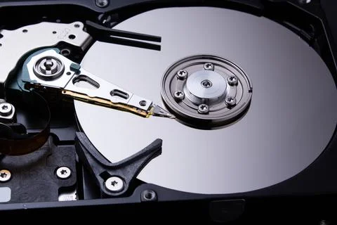 Hard disk closeup. Detail of a computer. Stock Photos