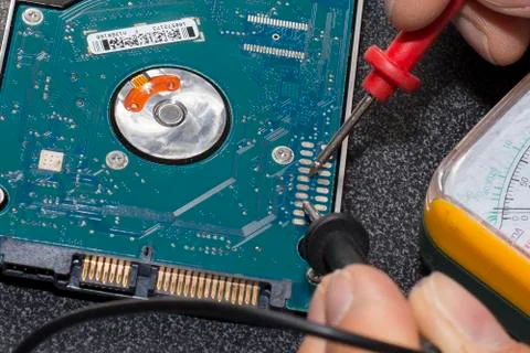 Hard Disk Control with tester Stock-Fotos