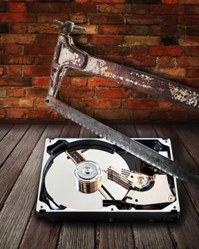 Hard disk cut with a hacksaw Stock Photos