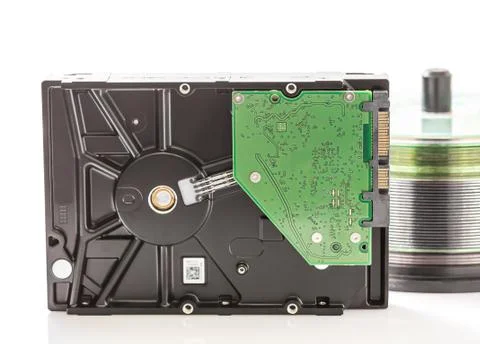Hard disk drive and compact discs Stock Photos
