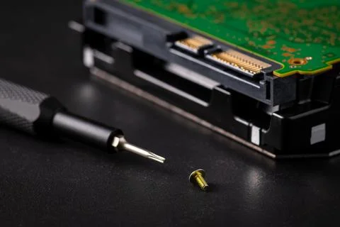 Hard disk drive and printed circuit board with SATA power connector. Magnet.. Stock Photos