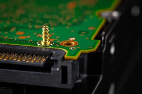 Hard disk drive and printed circuit board with SATA power connector. Magnet.. Stock Photos