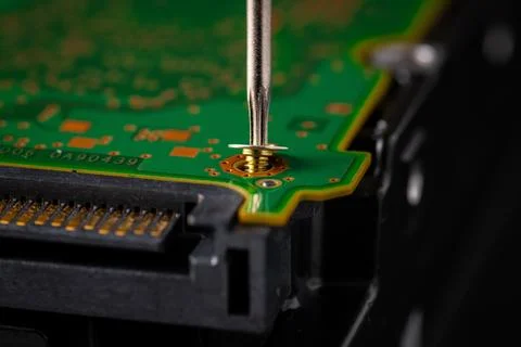 Hard disk drive and printed circuit board with SATA power connector. Magnet.. Stock Photos