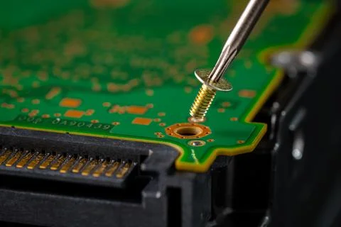 Hard disk drive and printed circuit board with SATA power connector. Magnet.. Stock Photos