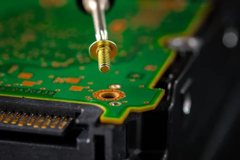 Hard disk drive and printed circuit board with SATA power connector. Magnet.. Stock Photos