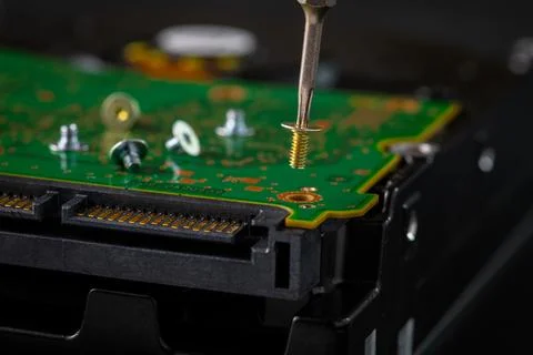 Hard disk drive and printed circuit board with SATA power connector. Magnet.. Stock Photos