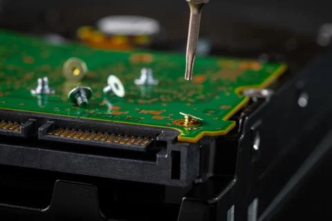 Hard disk drive and printed circuit board with SATA power connector. Magnet.. Stock Photos