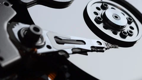 Hard Disk Drive, Close up of a hard disk drive reading and writing data. Stock Footage 104980704