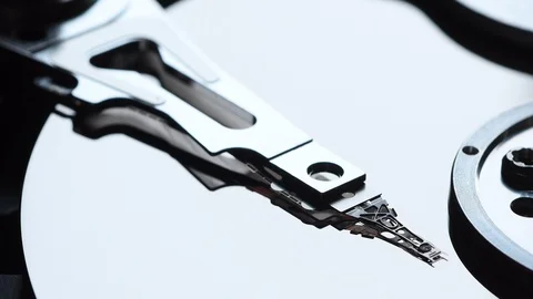 Hard Disk Drive, Close up of a hard disk drive starts reading and writing data. Stock Footage 104981162