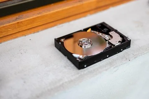 Hard disk drive on a concrete surface Stock Photos