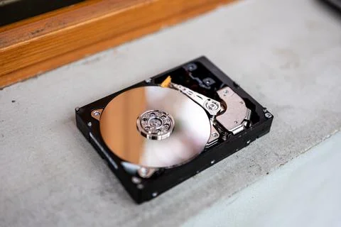Hard disk drive on a concrete surface Stock Photos