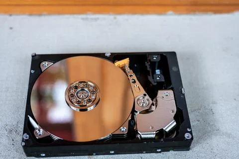 Hard disk drive on a concrete surface Stock Photos