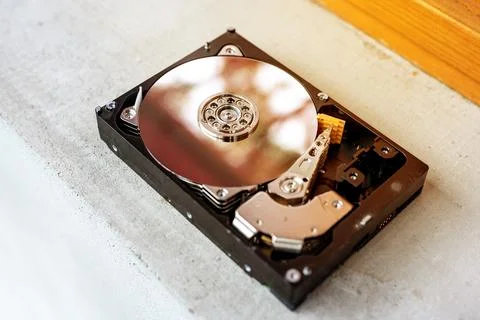 Hard disk drive on a concrete surface Foto stock