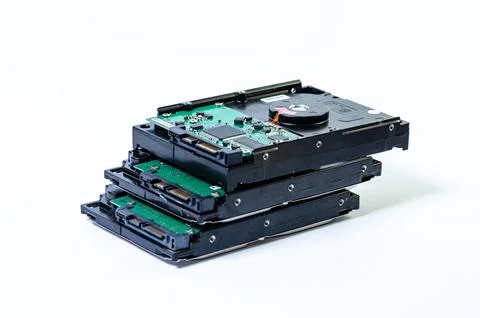 Hard disk drive HDD of different size isolated on white. Stock Photos