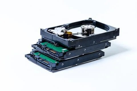 Hard disk drive HDD of different size isolated on white. Stock Photos