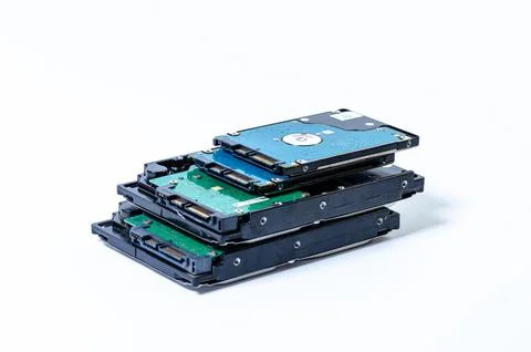 Hard disk drive HDD of different size isolated on white. Stock Photos