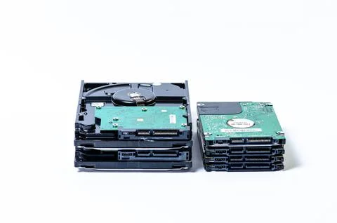 Hard disk drive HDD of different size isolated on white. Stock Photos