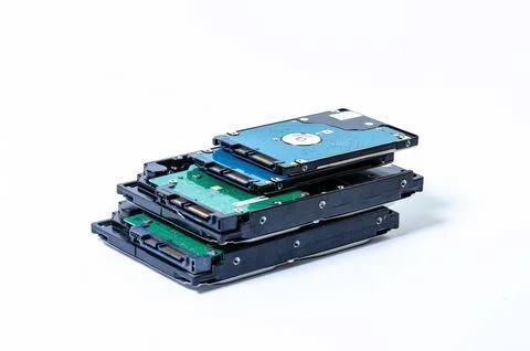 Hard disk drive HDD of different size isolated on white. Stock Photos