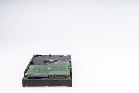 Hard Disk Drive (HDD) on White Background with Circuit Board Foto stock