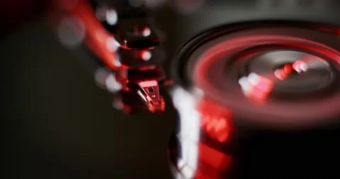 Hard disk drive. Hi tech work in motion. Spin up disk inside computer. Stock Footage 194655146