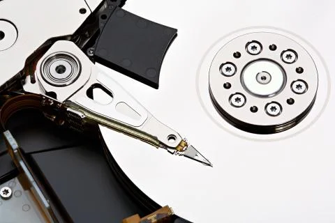 Hard disk drive inside. Data safety concept. Stacked photo. Stock Photos