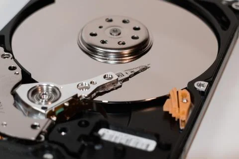 Hard disk drive inside. magnetic head, magnetic surface of the disk Stock Photos