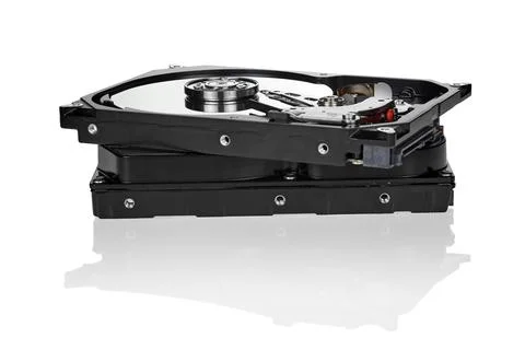 Hard disk drive internal components isolated on white background Stock Photos