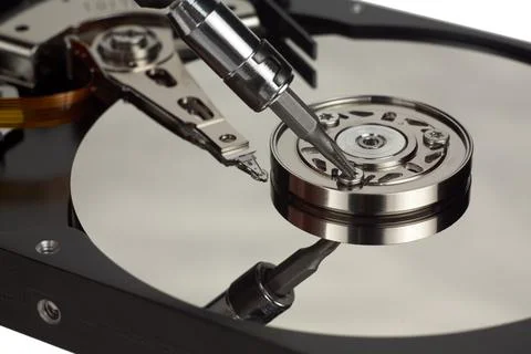 Hard disk drive internal components isolated on white background Stock Photos