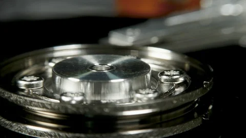 Hard disk drive on the rotation table, macro shot Stock Footage 100536565