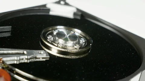 Hard disk drive on the rotation table, macro shot Stock Footage 100538221