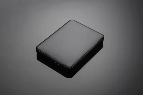 Hard disk external on black background Stock Photos