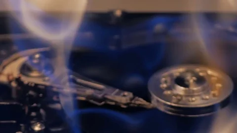 Hard disk on fire close up Stock Footage 73688733