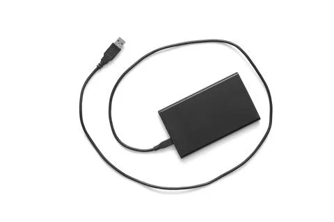 A Hard disk (HD) or Solid state disk (SSD), with an USB cable isolated on white Stock Photos