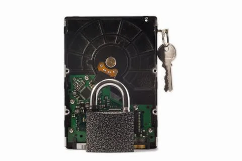 Hard disk, keys and padlock on a white background. The lock is locked. Stock Photos