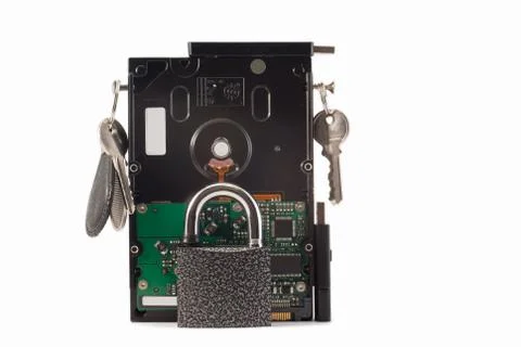 Hard disk, keys and padlock on a white background. The lock is locked. Stock Photos