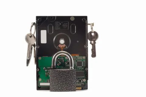 Hard disk, keys and padlock on a white background. The lock is locked. Stock Photos