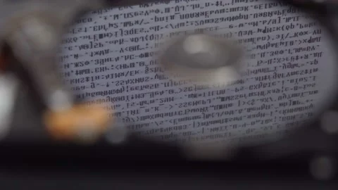 Hard disk is lying on table, blinking and spinning disk. Work of hacked Video stock 137636400
