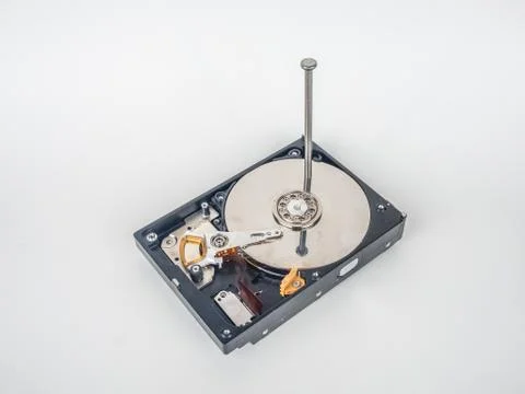 Hard disk with the nail Stock Photos