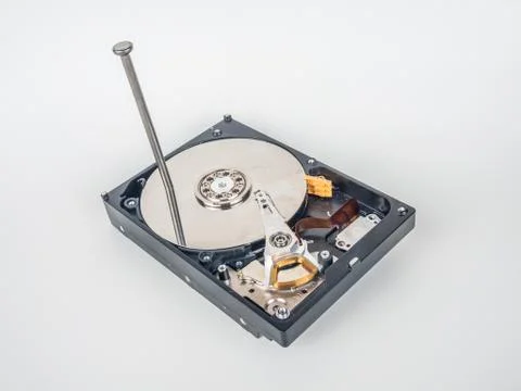 Hard disk with the nail Stock Photos