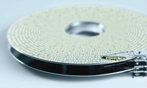 Hard disk platter and actuator arm detail shot of a separated hard disk pl... Stock Photos