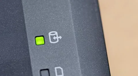 Hard drive activity light indicator blinking on a laptop computer, object d.. Stock Photos