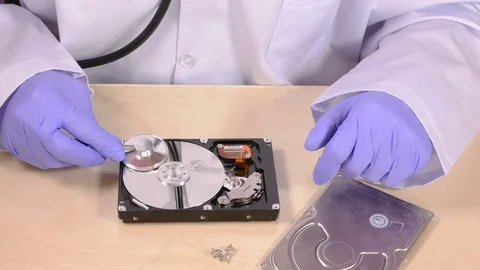 Hard drive and stethoscope Stock Footage 70376951