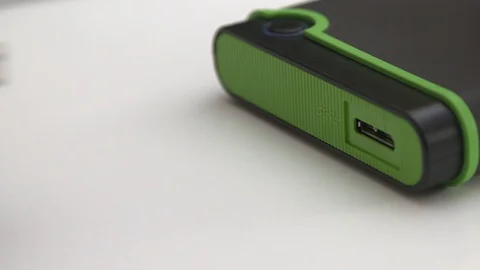 Hard-drive being connected via USB Stock Footage 92525177