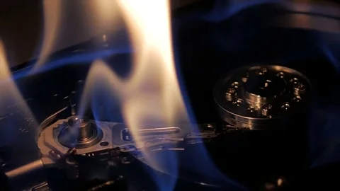 Hard drive burn in flames close-up. Data lost. Business data loss Stock Footage 73688776