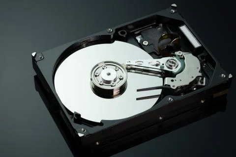 Hard drive from the computer hdd with mirror effect. Stock Photos