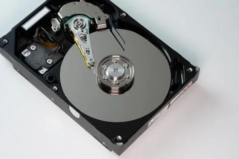 Hard drive from the computer hdd with mirror effect. Close-up, macro. Stock Photos
