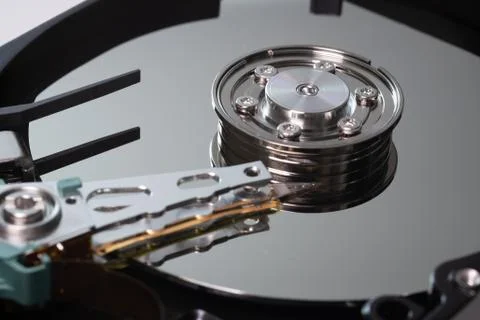 Hard drive from the computer hdd with mirror effect. Close-up, macro. Stock Photos