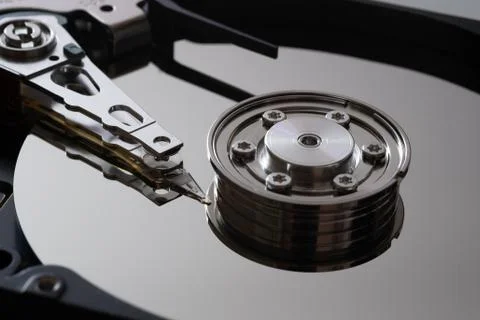 Hard drive from the computer hdd with mirror effect. Close-up, macro. Stock Photos