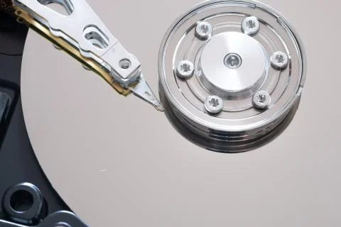 Hard drive from the computer hdd with mirror effect. Close-up, macro. Stock Photos